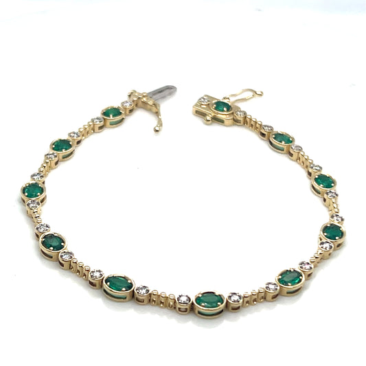 Yellow Gold Emerald and Diamond Line Bracelet